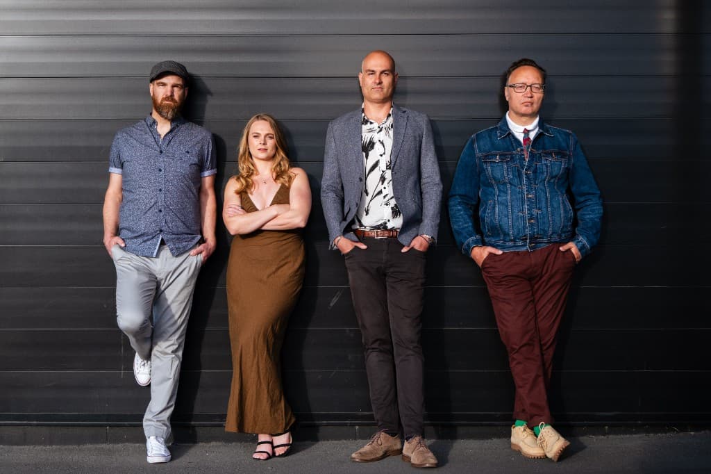 Midnight Fizz — four-piece against a slatted wall